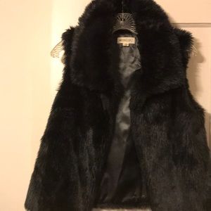 Black faux fur vest